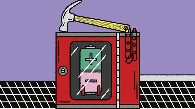 A red box, inside which hangs a battery, stands out of a tiled floor. On top of the box lies a hammer, which is attached.