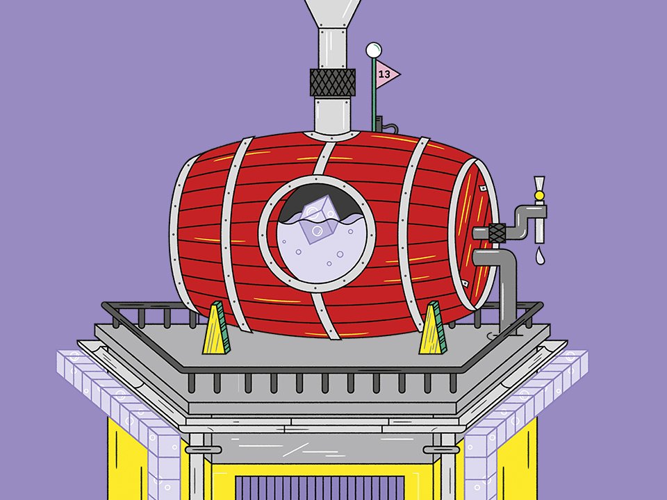 large red barrel filled with water on a platform.